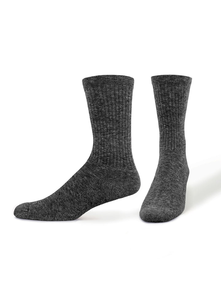 Pair of black marled socks on a white background