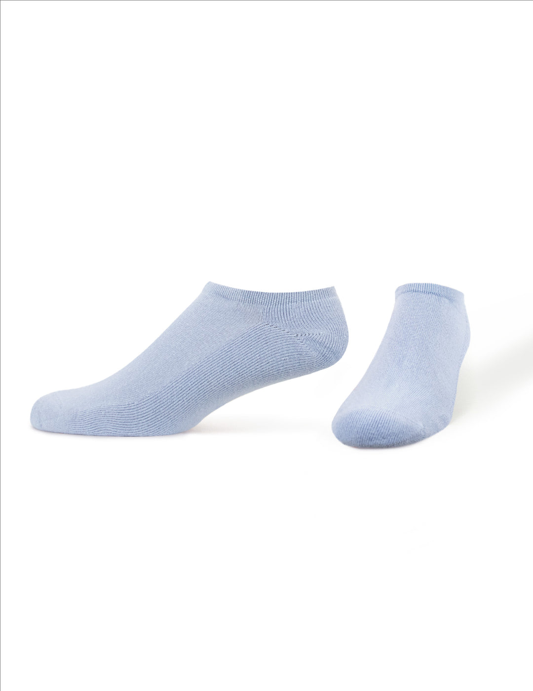 Pair of light blue socks on a white background
