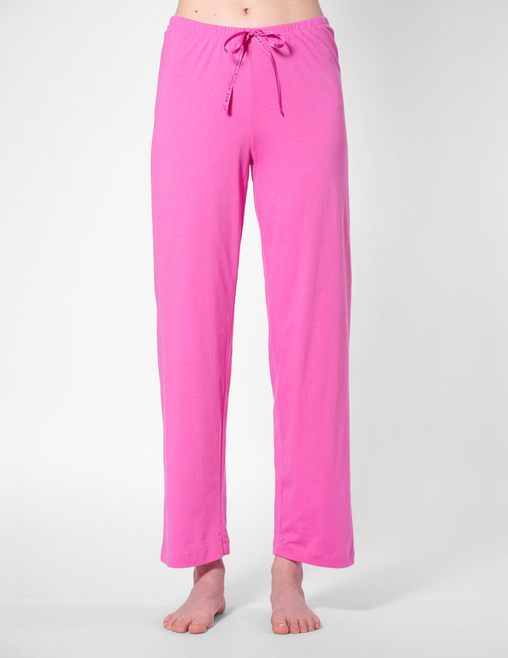 Pink pajama pants on a white background