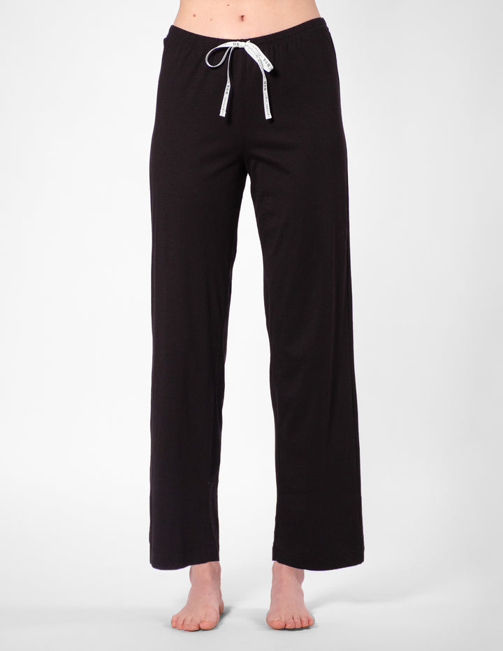Black pajama pants with a white drawstring on a white background