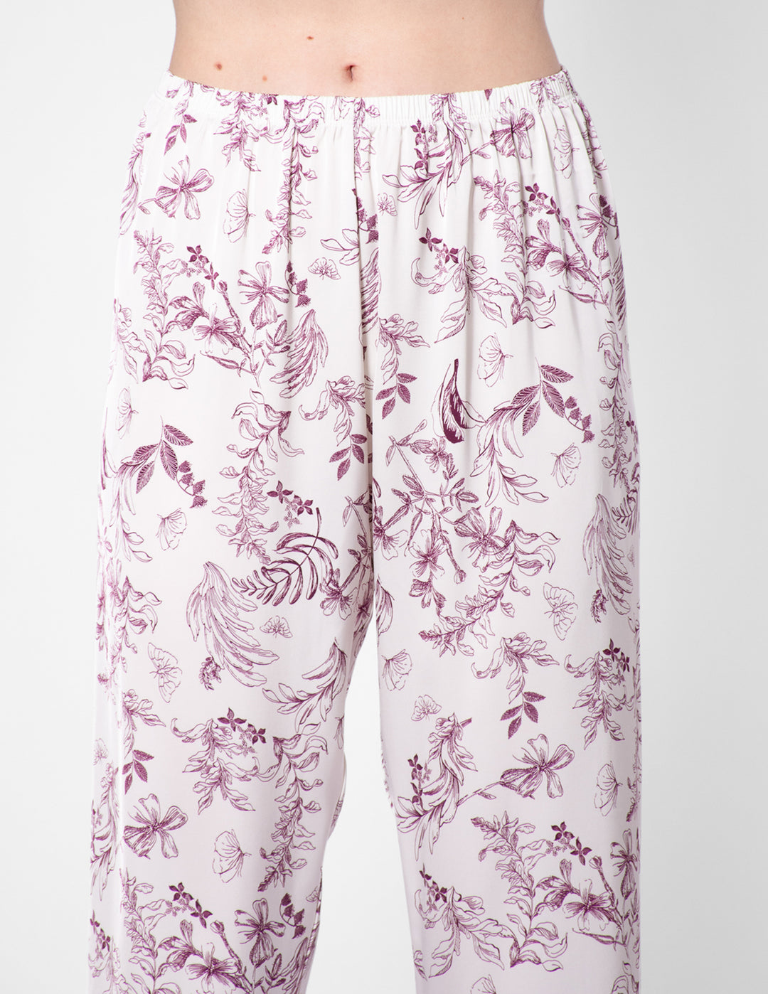 Floral-patterned pants on a white background