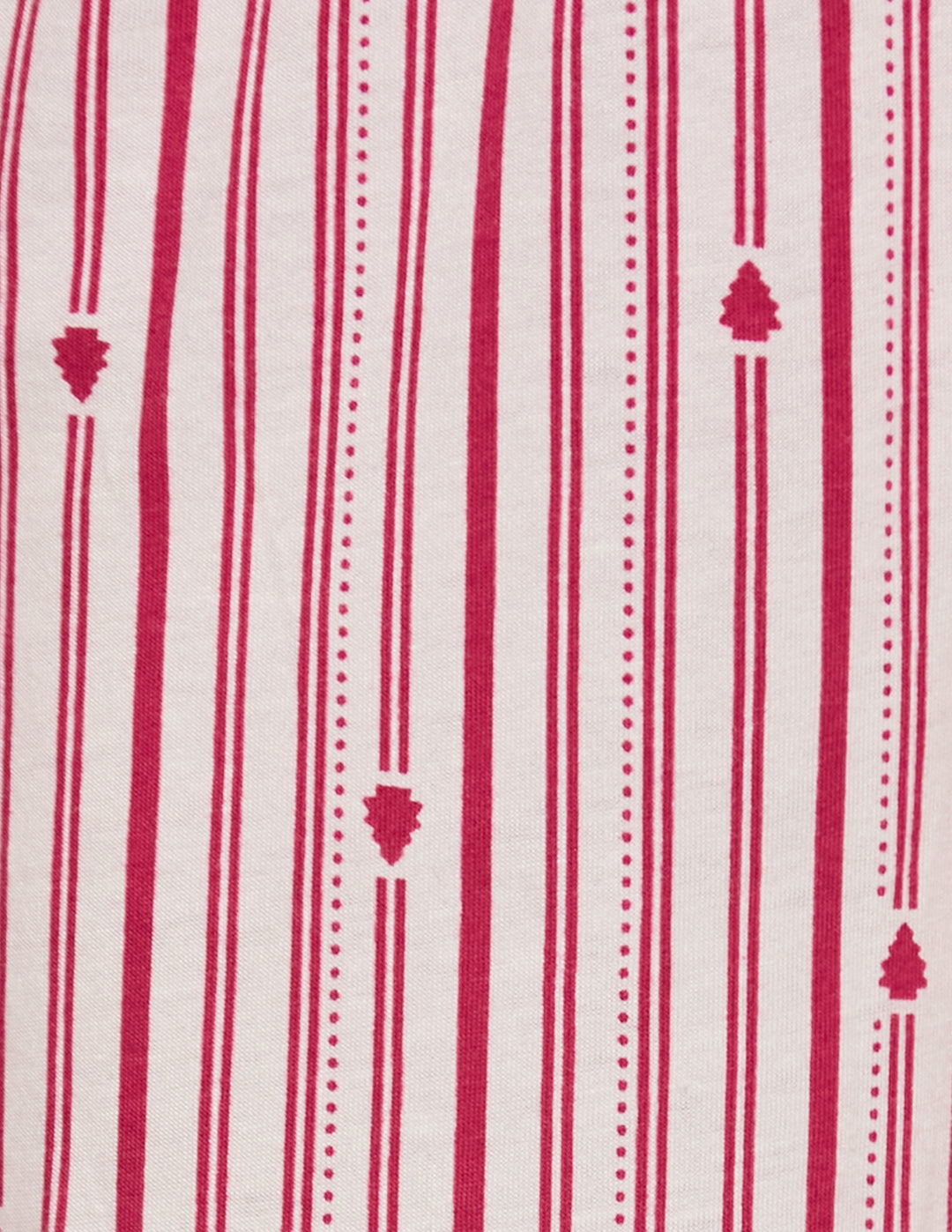 Detailed view of a white fabric with pink accent stripes and small tree designs.