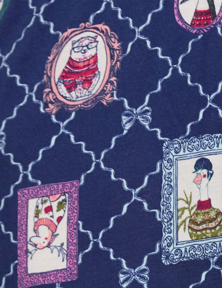 Detailed view of a navy fabric with an animal pattern design.