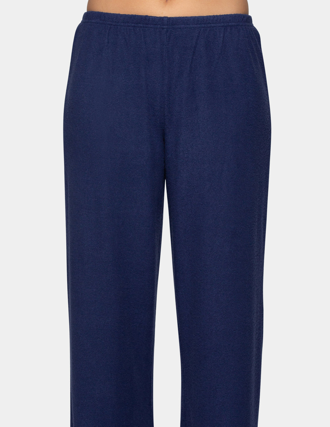 A model wearing navy pajama pants.