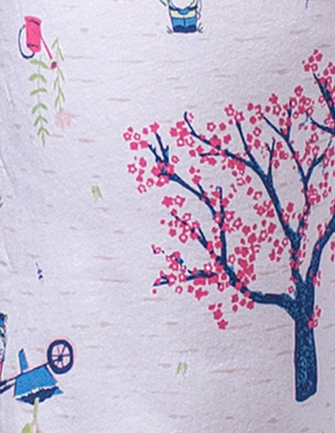 Close-up of a fabric with a tree and people pattern on a white background