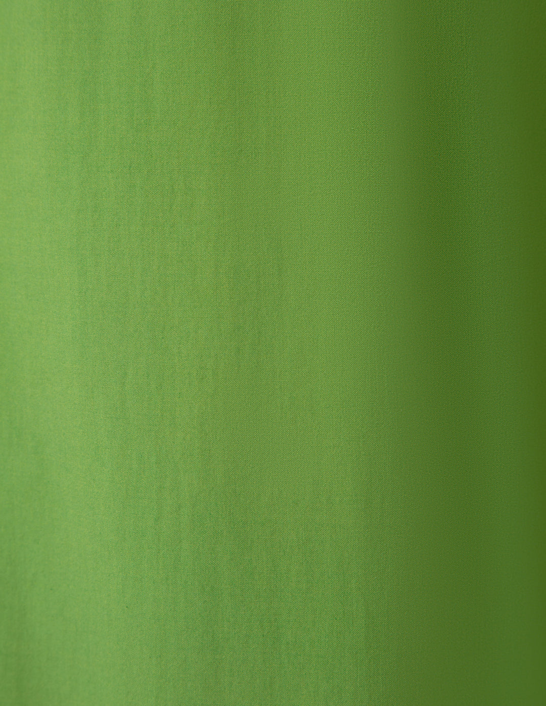 Green pajama pants close-up detail