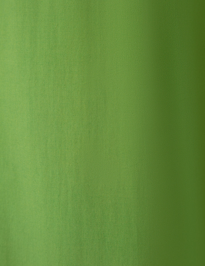 Green pajama pants close-up detail