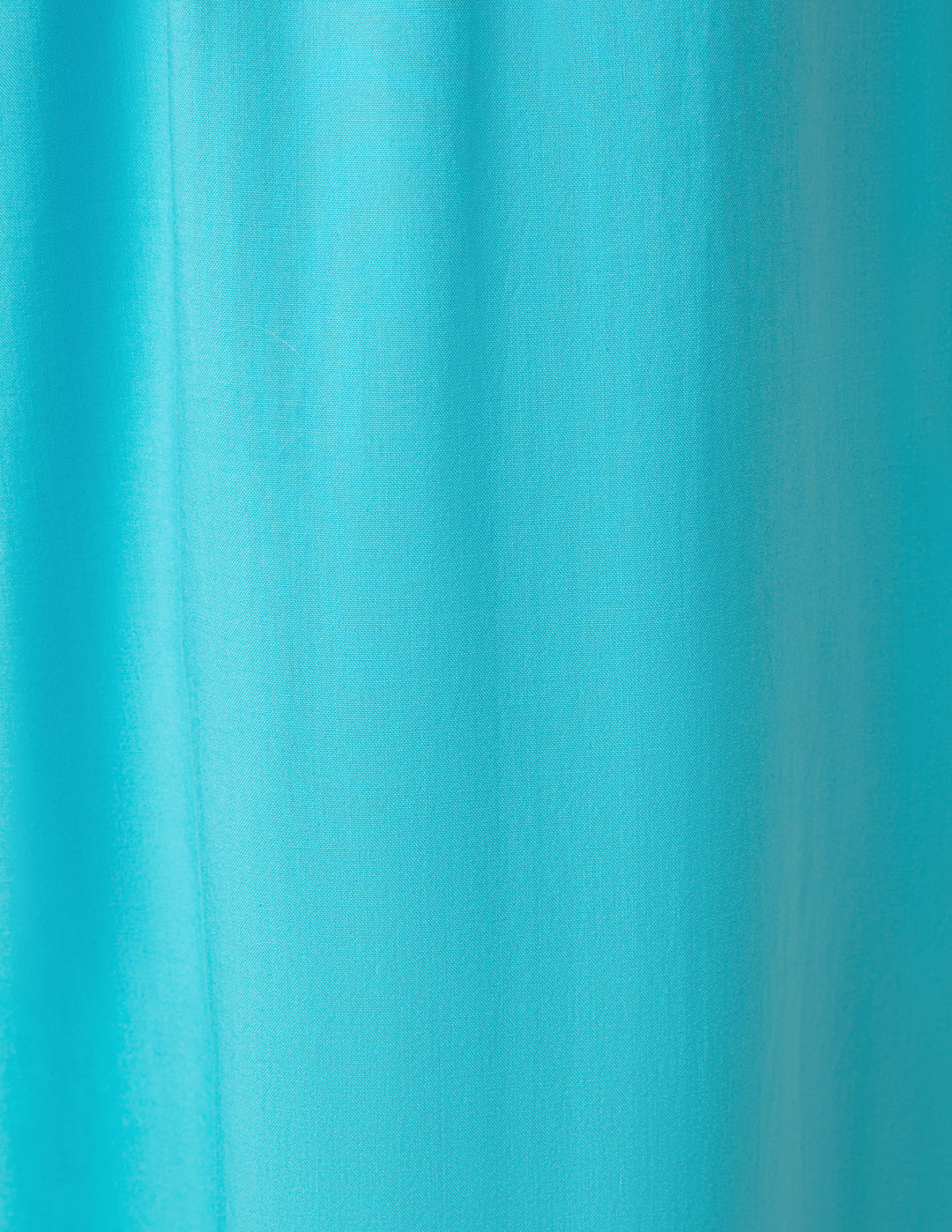 Close-up of a blue fabric with a soft texture