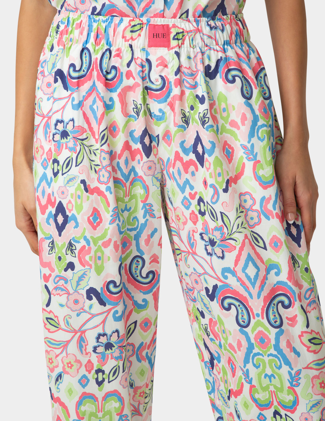 Colorful patterned pants worn by a person