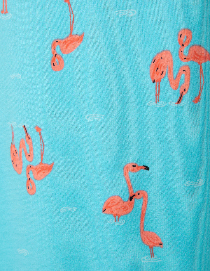 Pattern of pink flamingos on a blue background