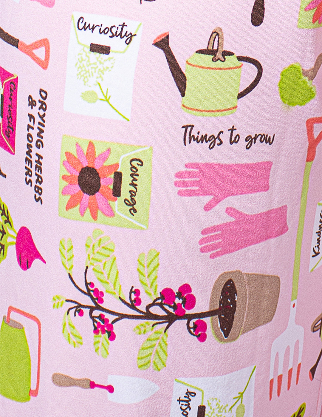Gardening-themed fabric with tools, plants, and text on a pink background