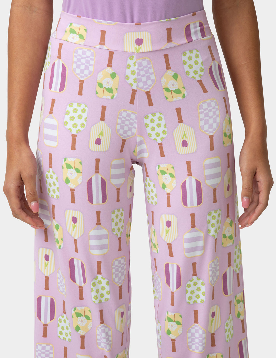 Purple leggings with ice cream pattern worn by a person