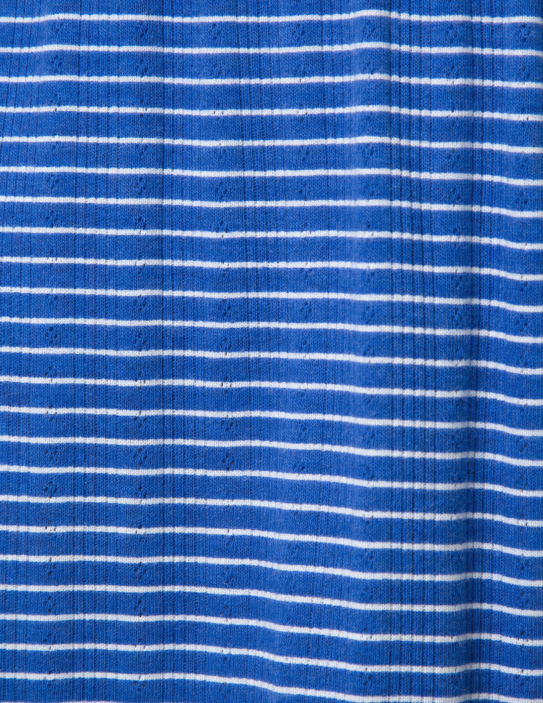 Close-up of blue fabric with white stripes