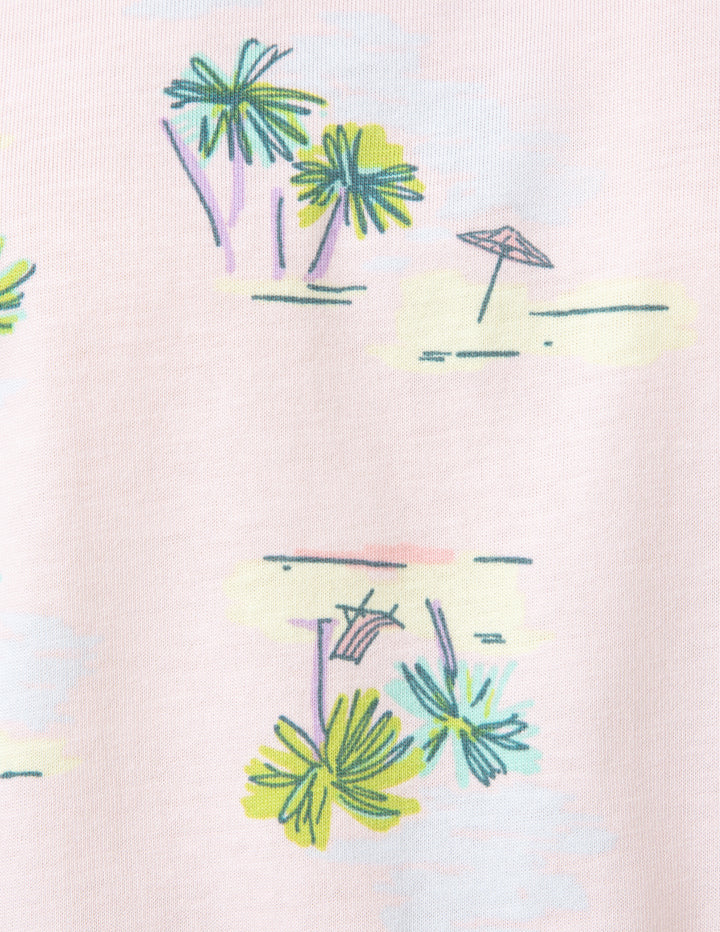 Colorful beach scene with palm trees and an umbrella on a light pink background