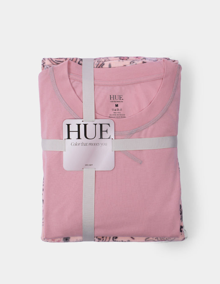 A pink pajama set displayed against a light grey background.