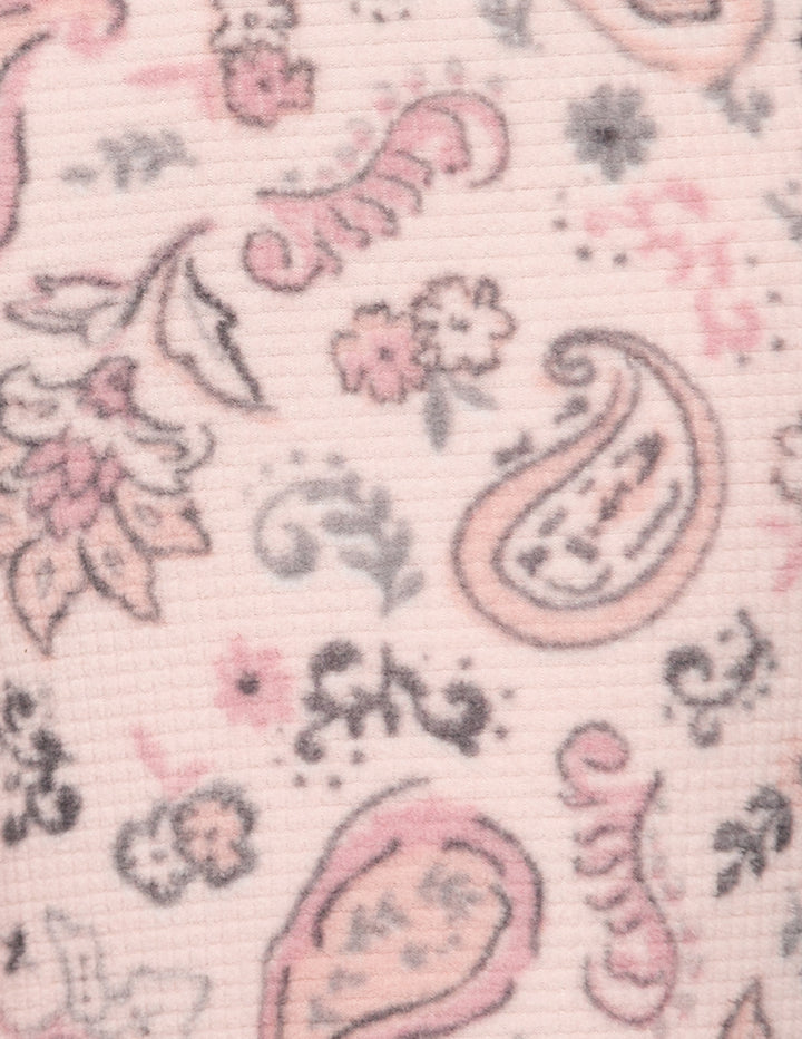 Closeup of a pink paisley pattern.