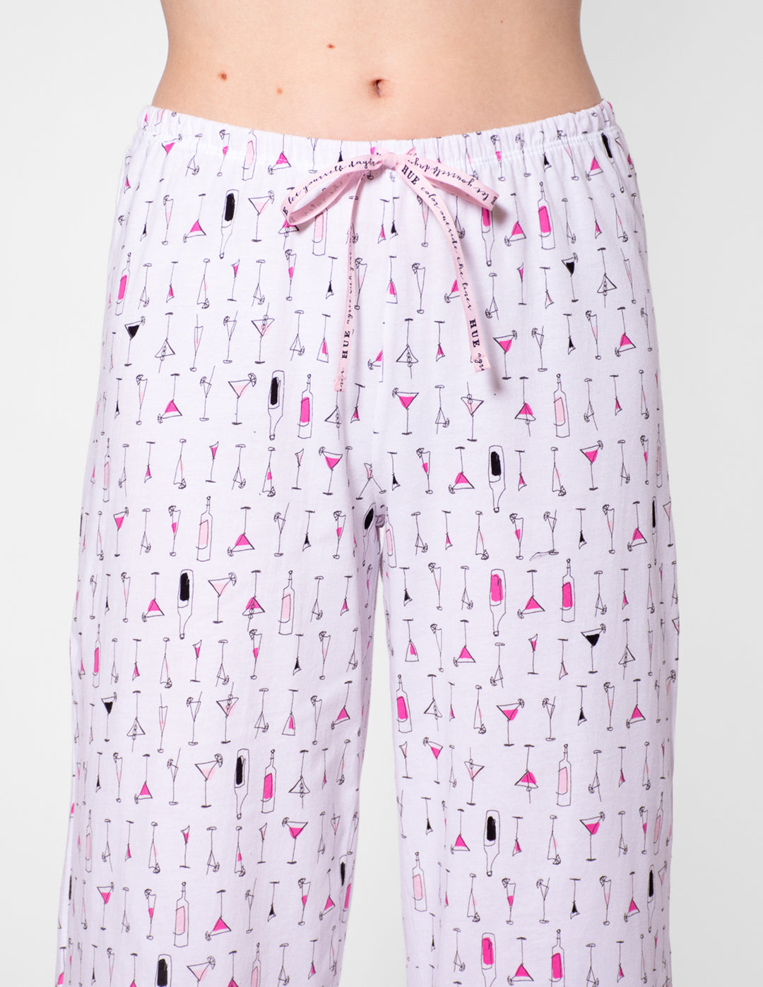 Pajama pants with cocktail pattern on a plain background