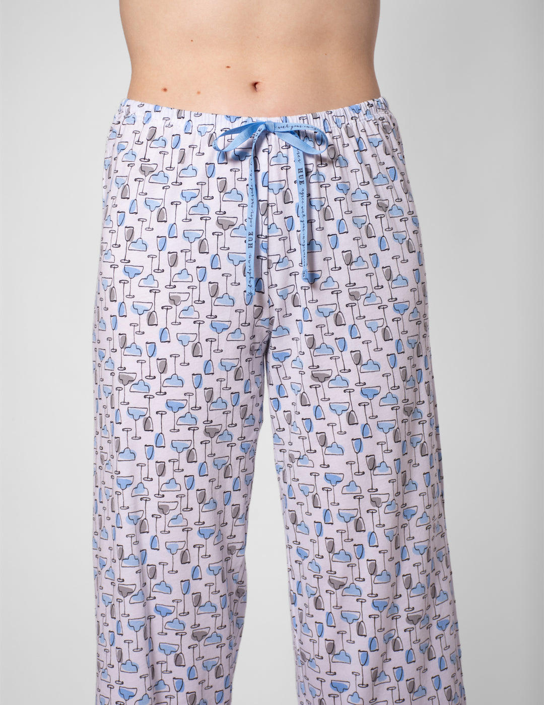 Patterned pajama pants with a drawstring on a gray background