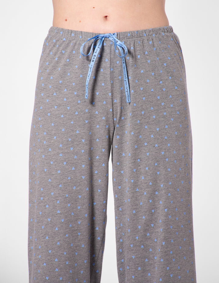 Gray pajama pants with a blue pattern on a white background
