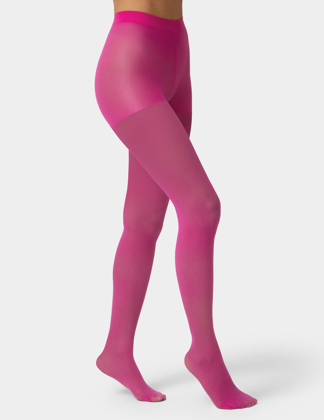 Pink tights worn by a person on a white background