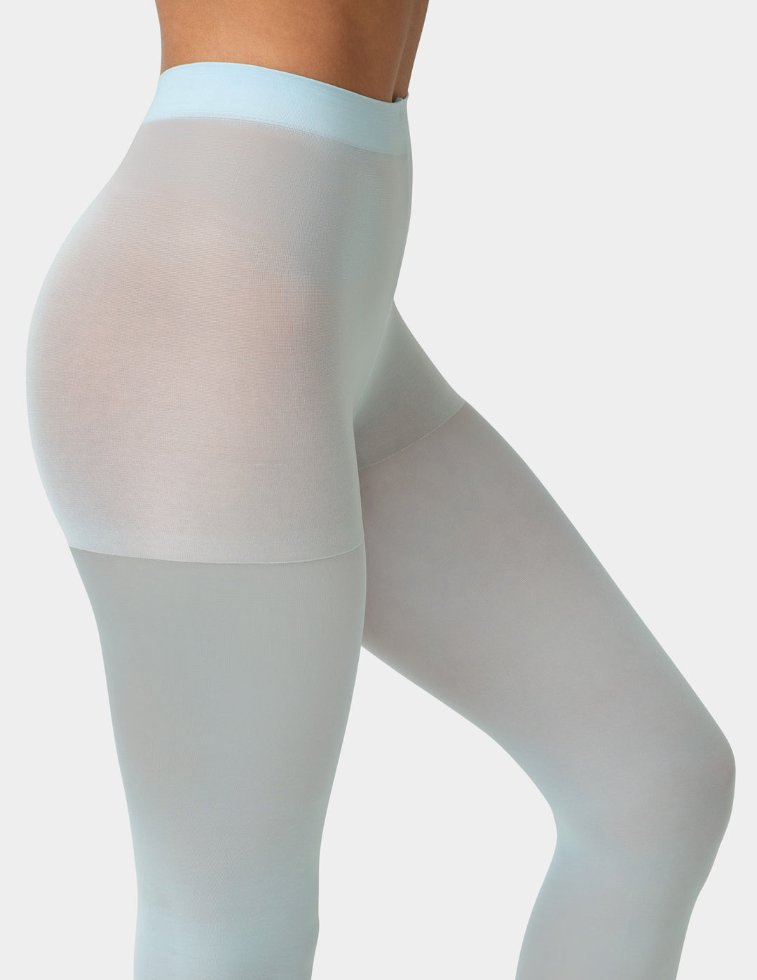 Sheer light blue tights on a plain background