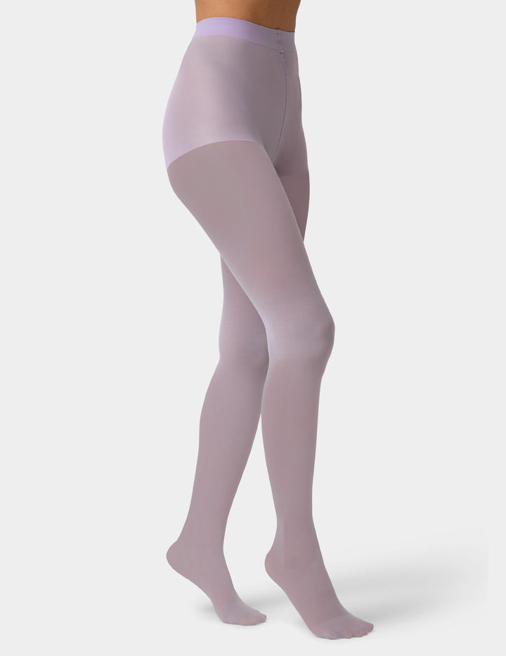 Lavender tights worn by a person on a white background