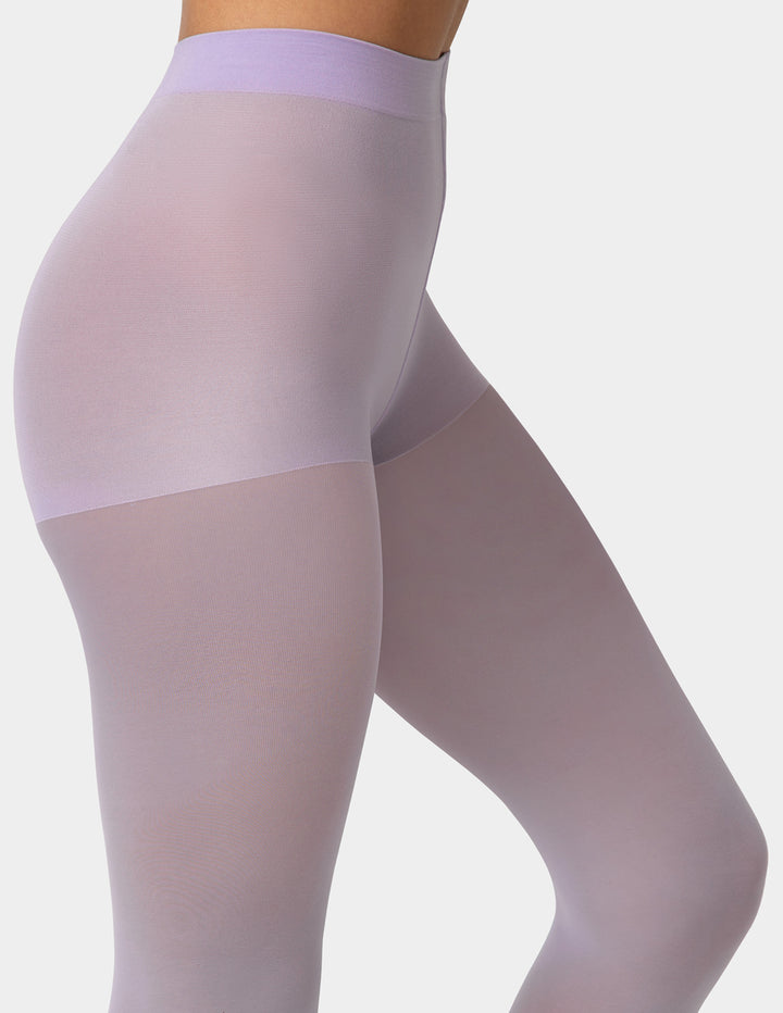 Sheer lavender tights on a plain background