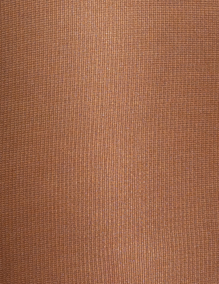 A close-up of a textured fabric material in a warm medium brown color, showing a fine ribbed or woven vertical pattern.