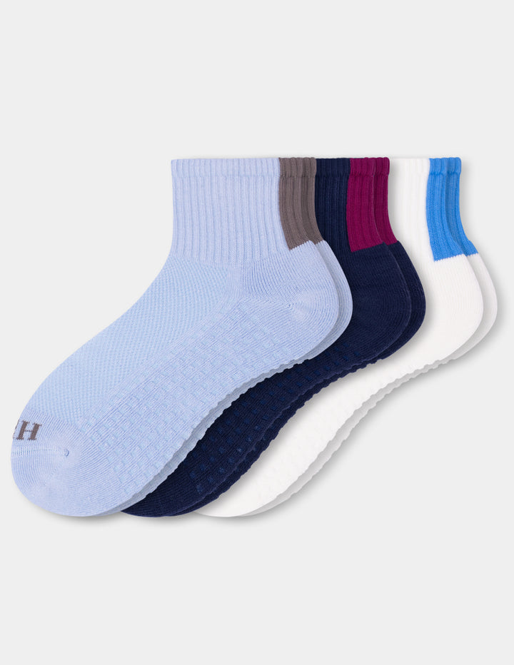 A 3-pack of mini crew socks in various colors, including light blue, navy, and white arranged on a white background.