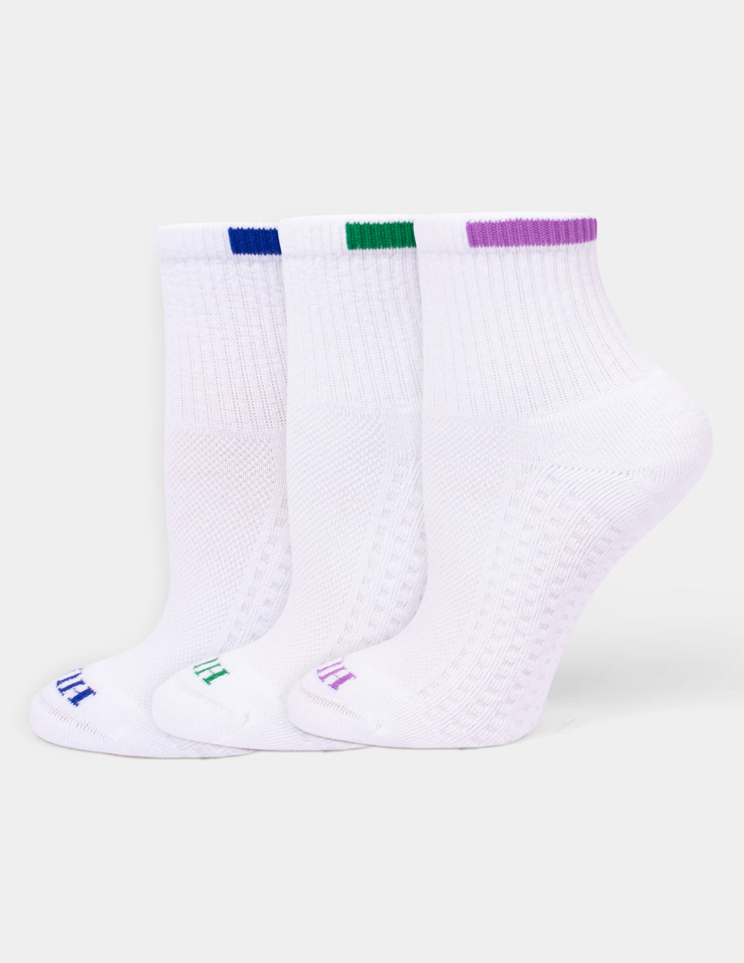 Three white ankle socks with colorful accents, displayed on a light gray background. 