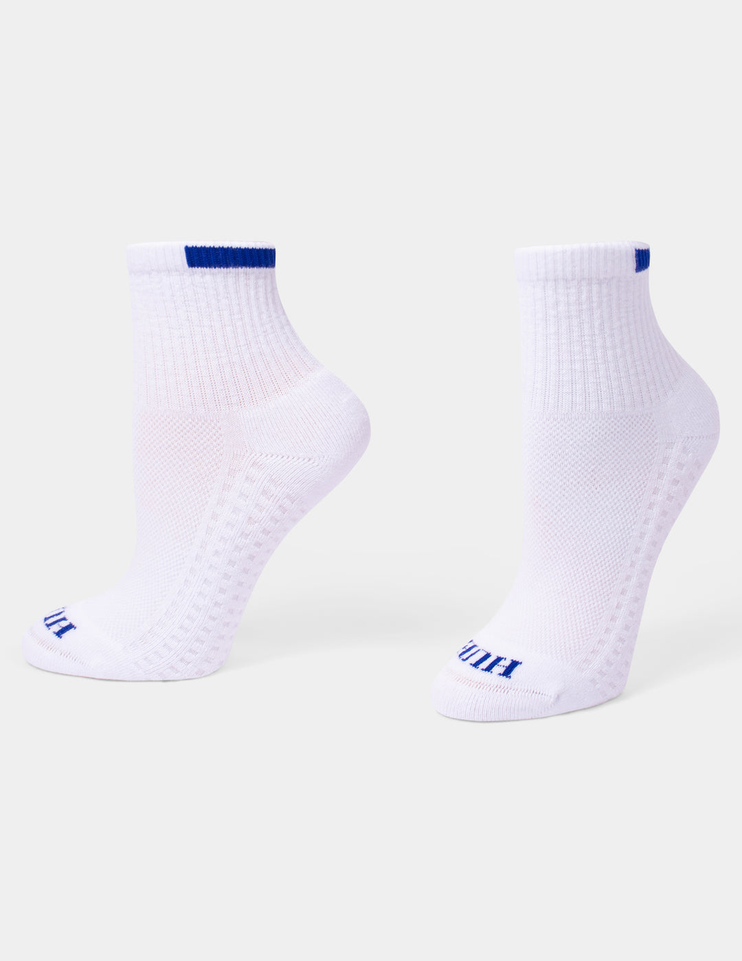 A pair of white mini crew athletic socks with blue accents displayed against a light gray background.