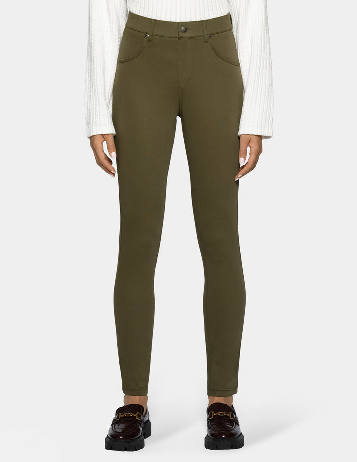 A model wearing olive green leggings
