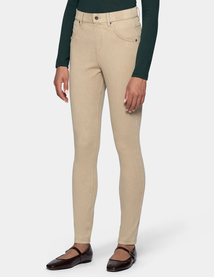 A model wearing beige leggings