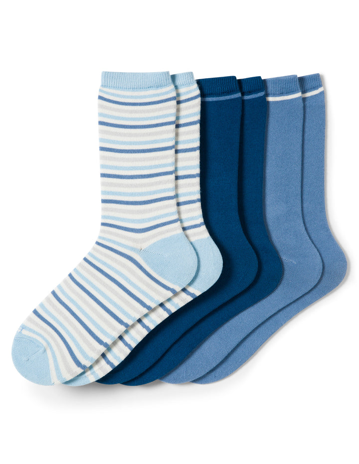 Set of blue and white striped socks on a white background