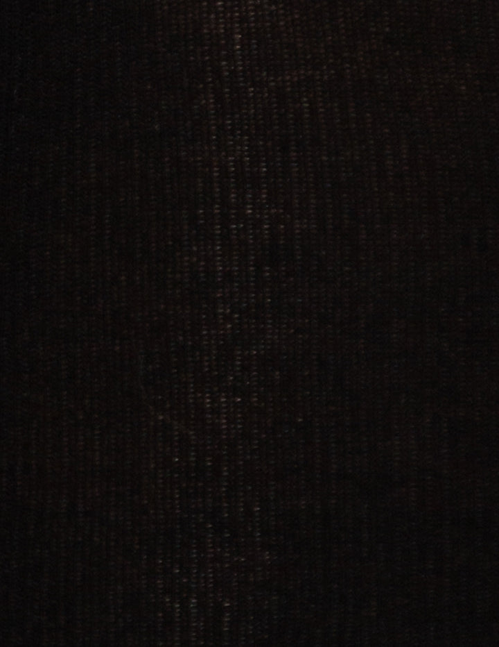 A close-up texture shot of a very dark, black woven fabric with subtle vertical ribbing.