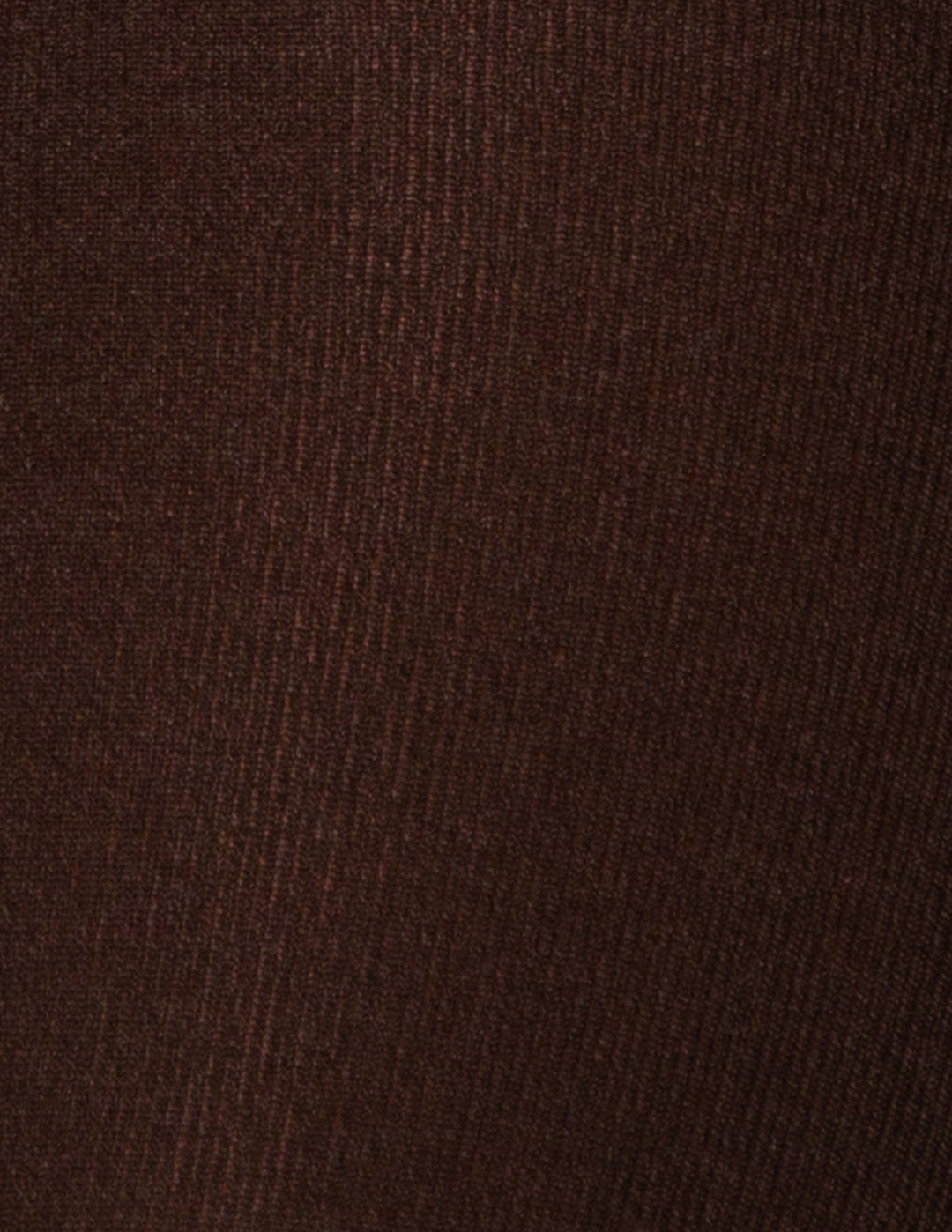 A close-up of a dark brown fabric.