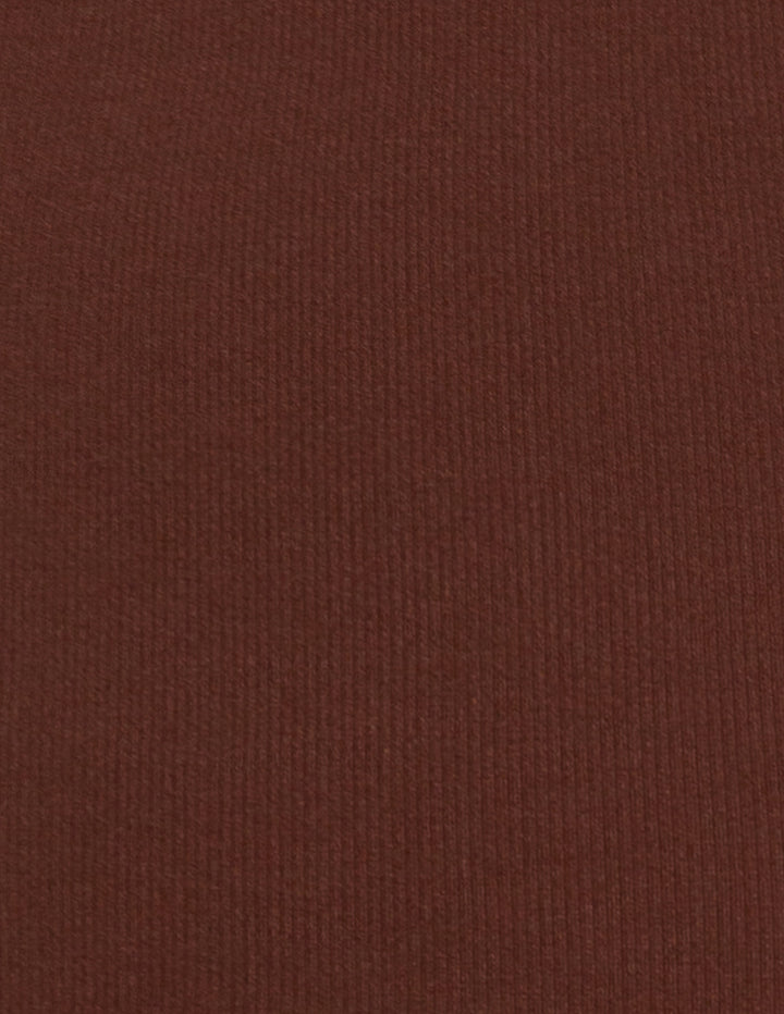 A close-up of a ribbed brown fabric texture.