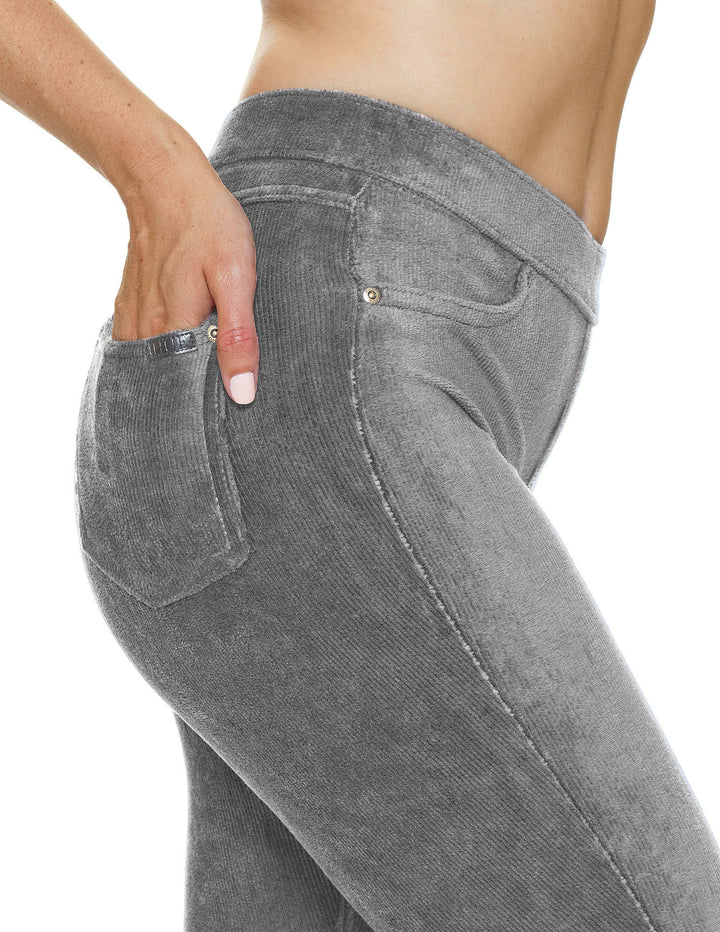 Gray leggings being worn on a white background