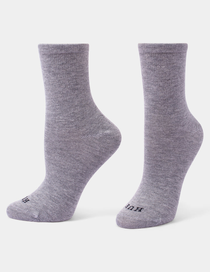 A pair of heather gray crew socks shown from the side against a plain light gray background.