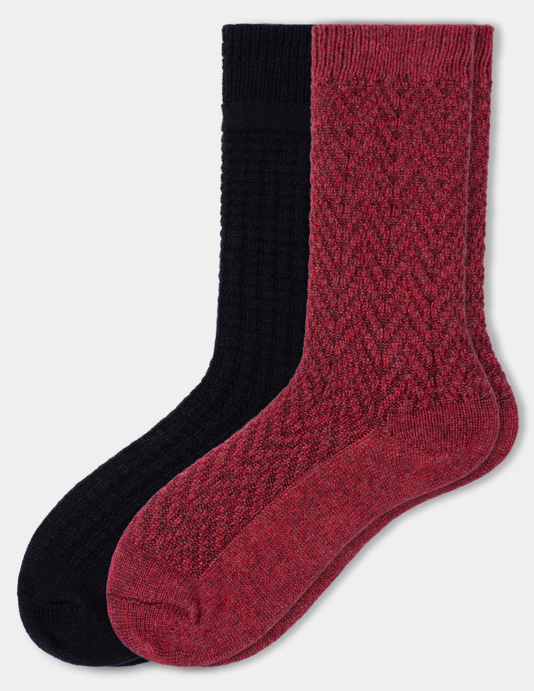 Two pairs of textured crew socks, one in black and one in heathered dark red, displayed overlapping against a plain white background.