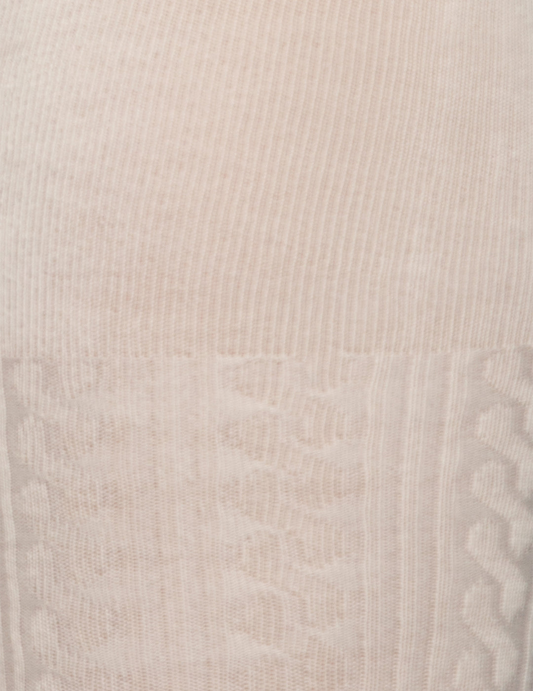 A close-up of an ivory color textured fabric