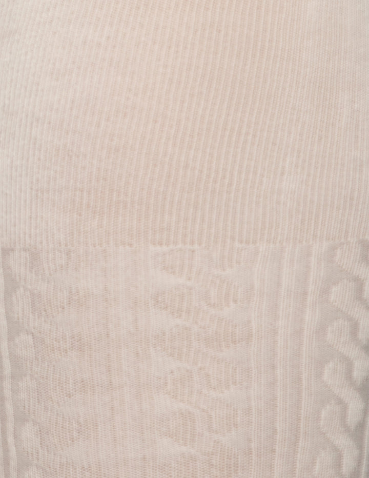 A close-up of an ivory color textured fabric