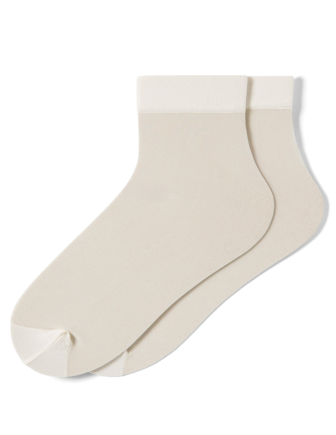 Pair of ivory socks lying flat