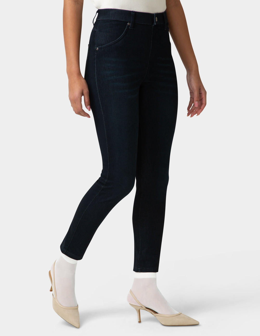 Person wearing pair of sheer ivory socks with heels