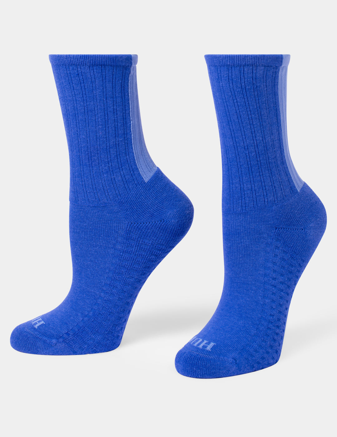 A pair of royal blue crew socks shown from the side and back on a light gray background.