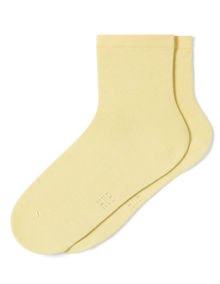 Yellow sock on a white background