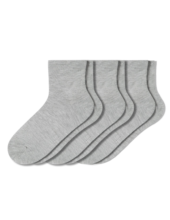 Set of three gray socks on a white background