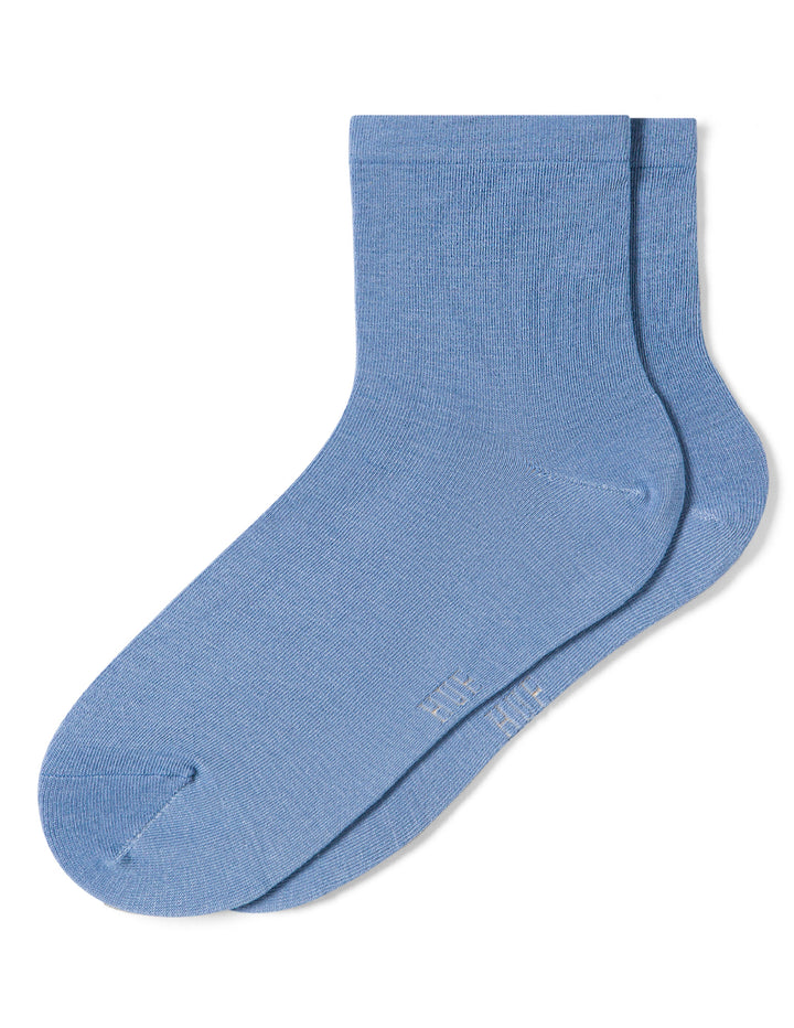 Blue pair of socks lying flat