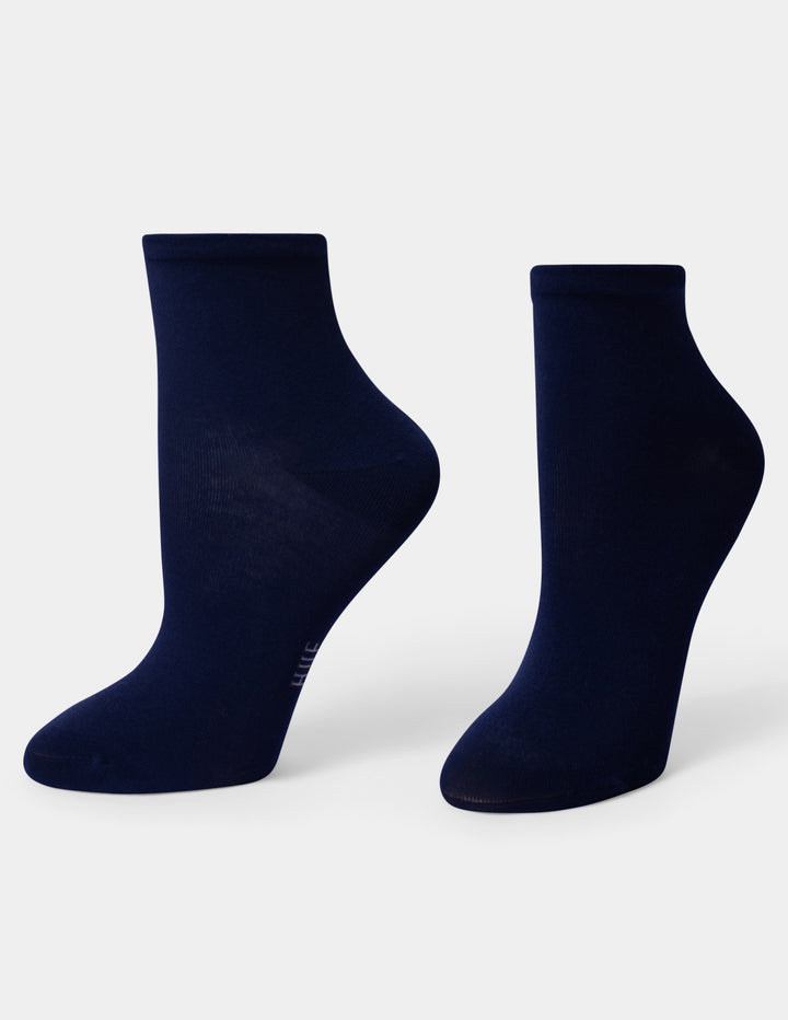 A pair of navy blue ankle socks displayed on foot forms against a clean, light gray background.