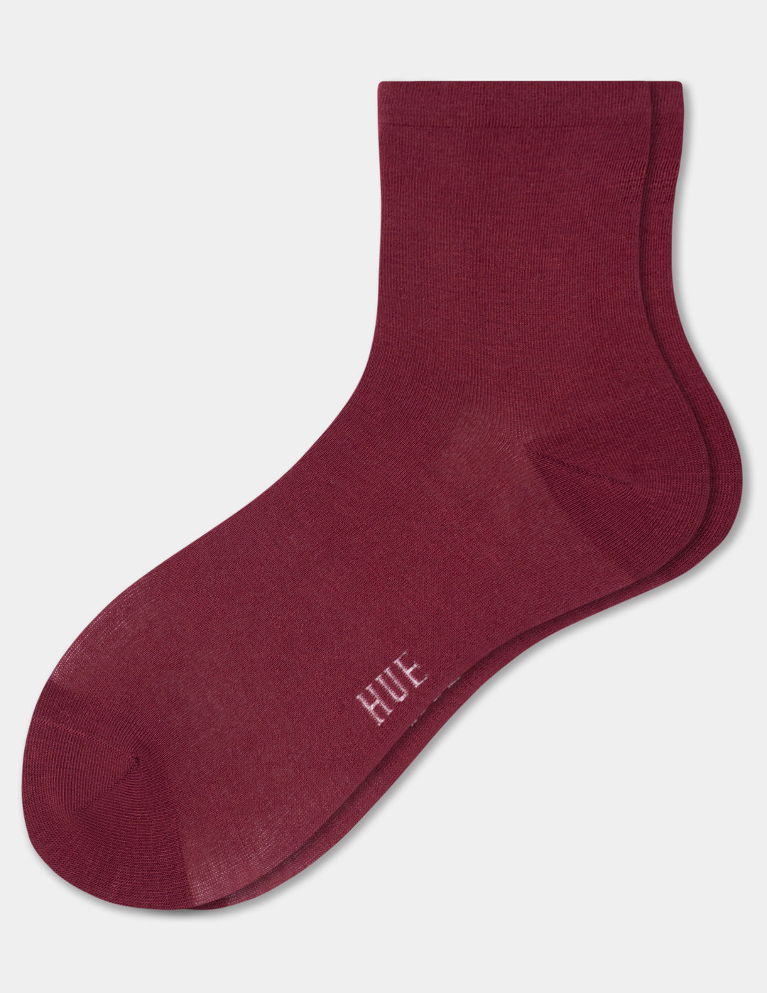A pair of crew socks in a deep burgundy color, featuring the brand name 'HUE' printed in white near the toe, shown against a light gray background.